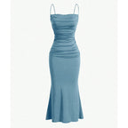 Light blue spaghetti strap maxi dress with ruched bodice and fitted skirt.