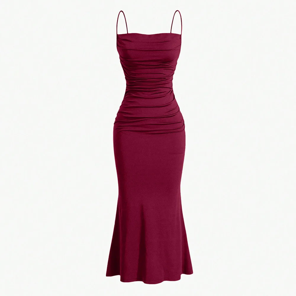 Dark red spaghetti strap maxi dress with ruched bodice and fitted long skirt.