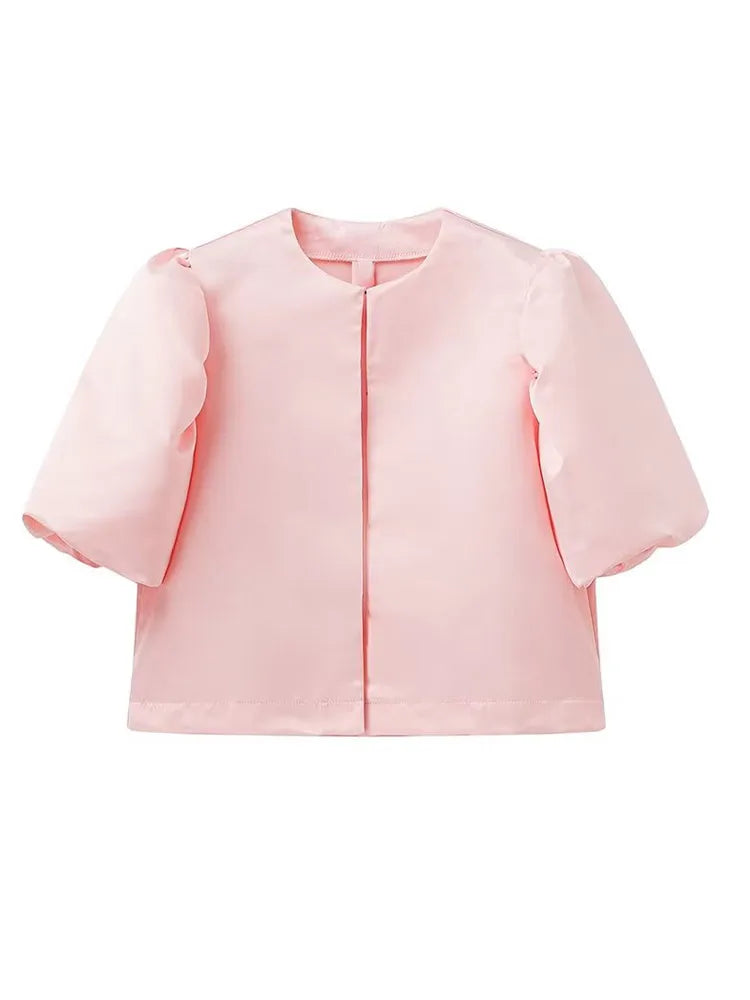 Pink puff sleeve blouse with front placket and rounded neckline