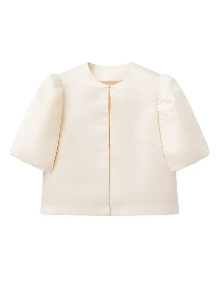 Ivory puff sleeve blouse with front button placket and smooth satin finish