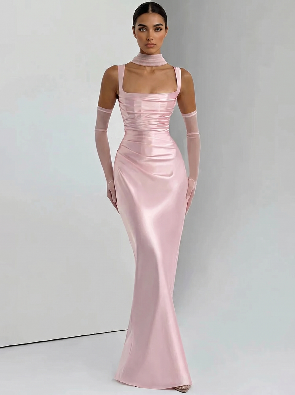 Blush pink backless maxi dress with square halter neckline, fitted satin with long skirt
