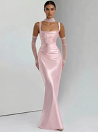 Blush pink backless maxi dress with square halter neckline, fitted satin with long skirt