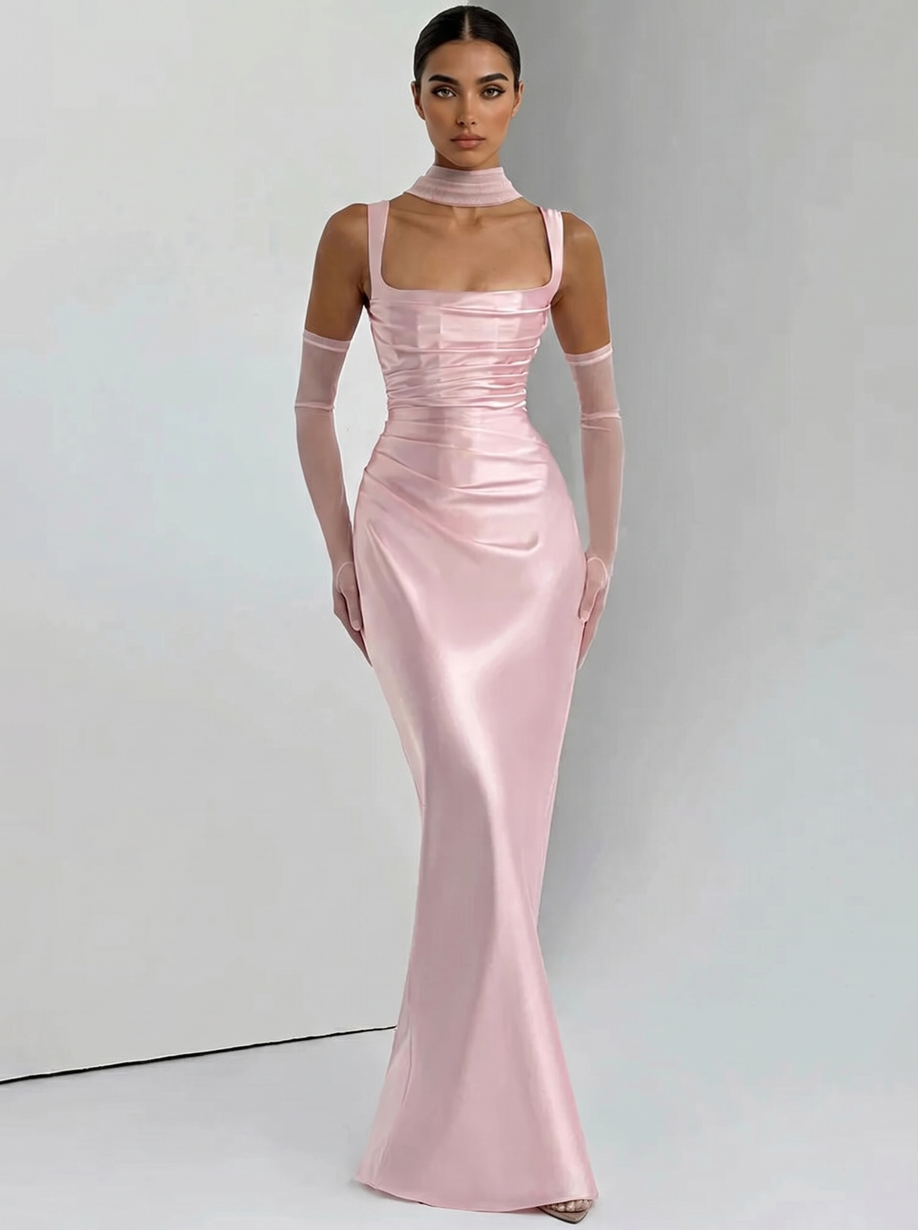 Blush pink backless maxi dress with square halter neckline, fitted satin with long skirt