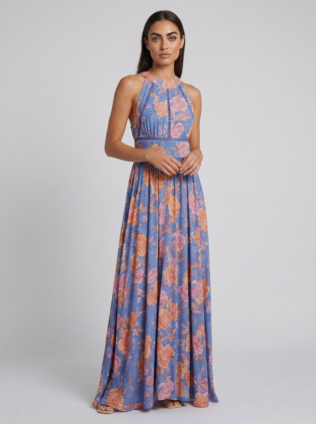 Blue floral sleeveless maxi dress with high neckline and gathered smocked waist