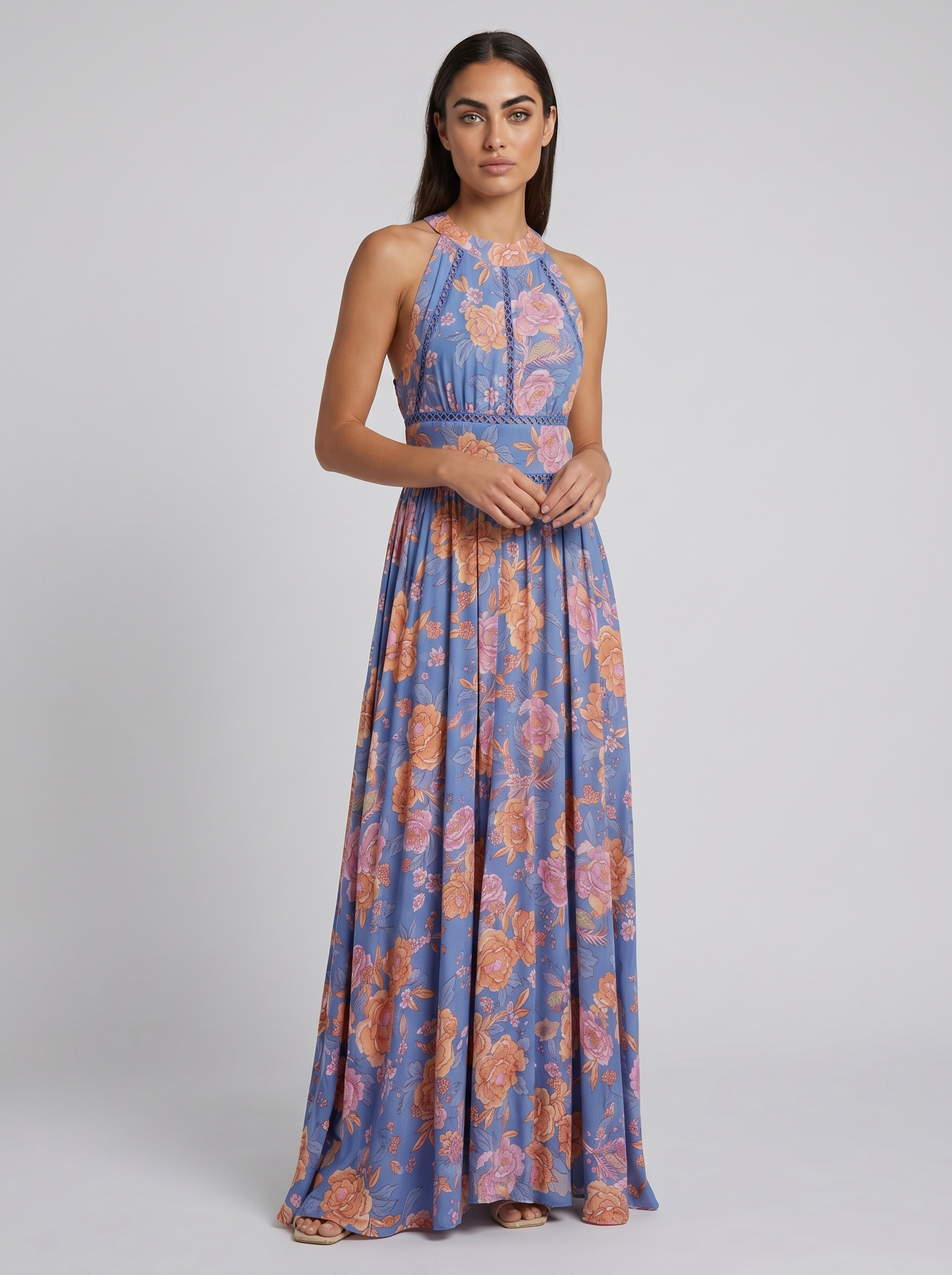 Blue floral sleeveless maxi dress with high neckline and gathered smocked waist