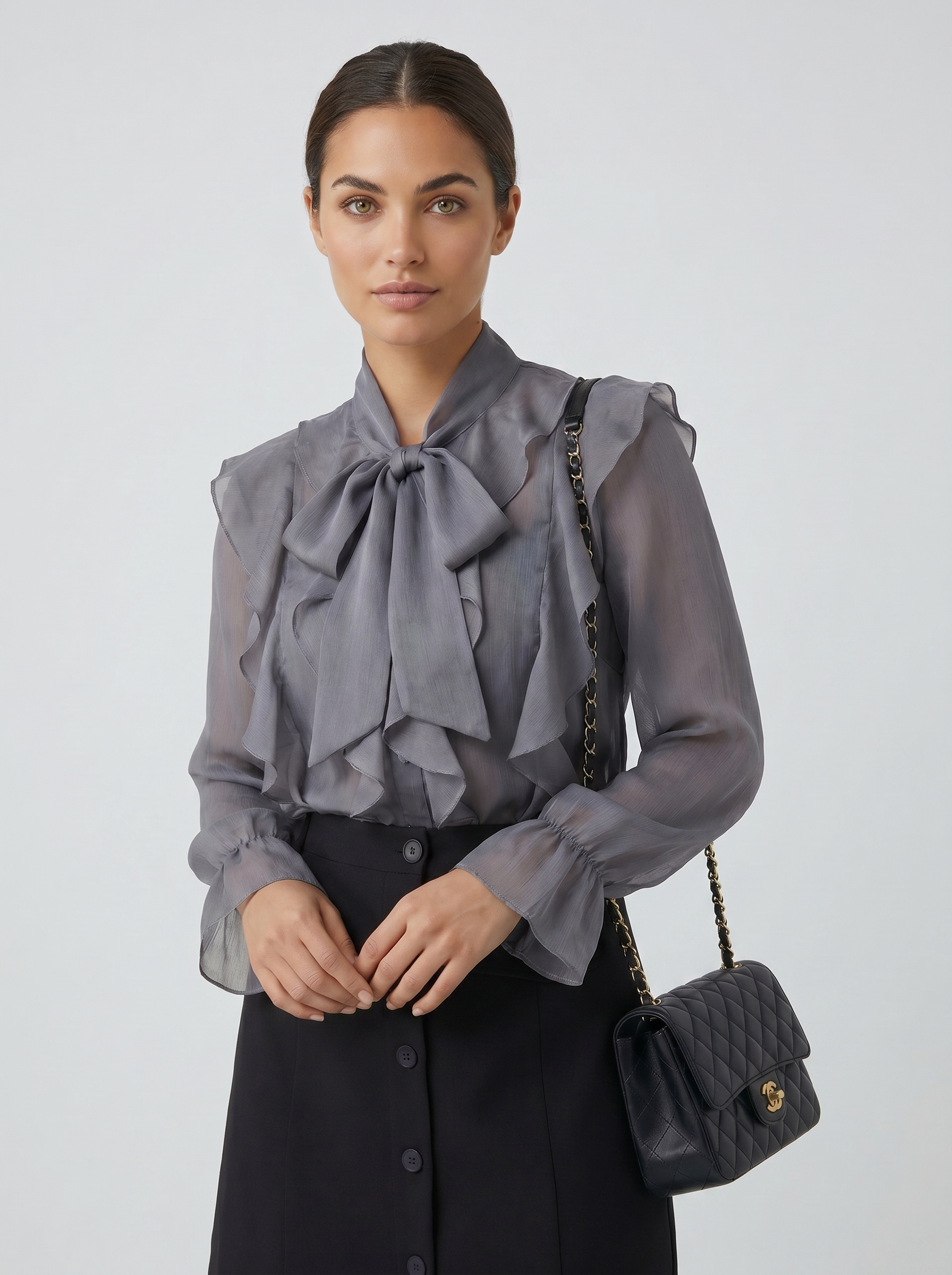 Gray chiffon blouse with voluminous ruffled front, tie-neck, and long sleeves