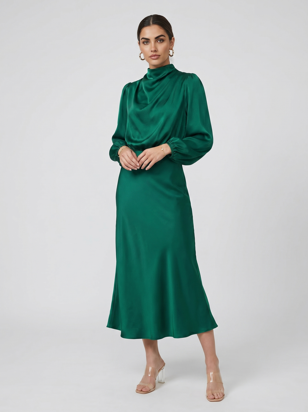 Green satin evening dress with long sleeves, high neck, midi length