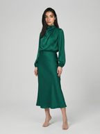 Deep green satin evening dress with long sleeves, high neck, midi length