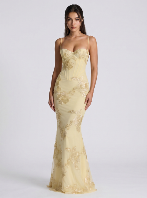 Lemon yellow floral evening dress with spaghetti straps and fitted mermaid silhouette