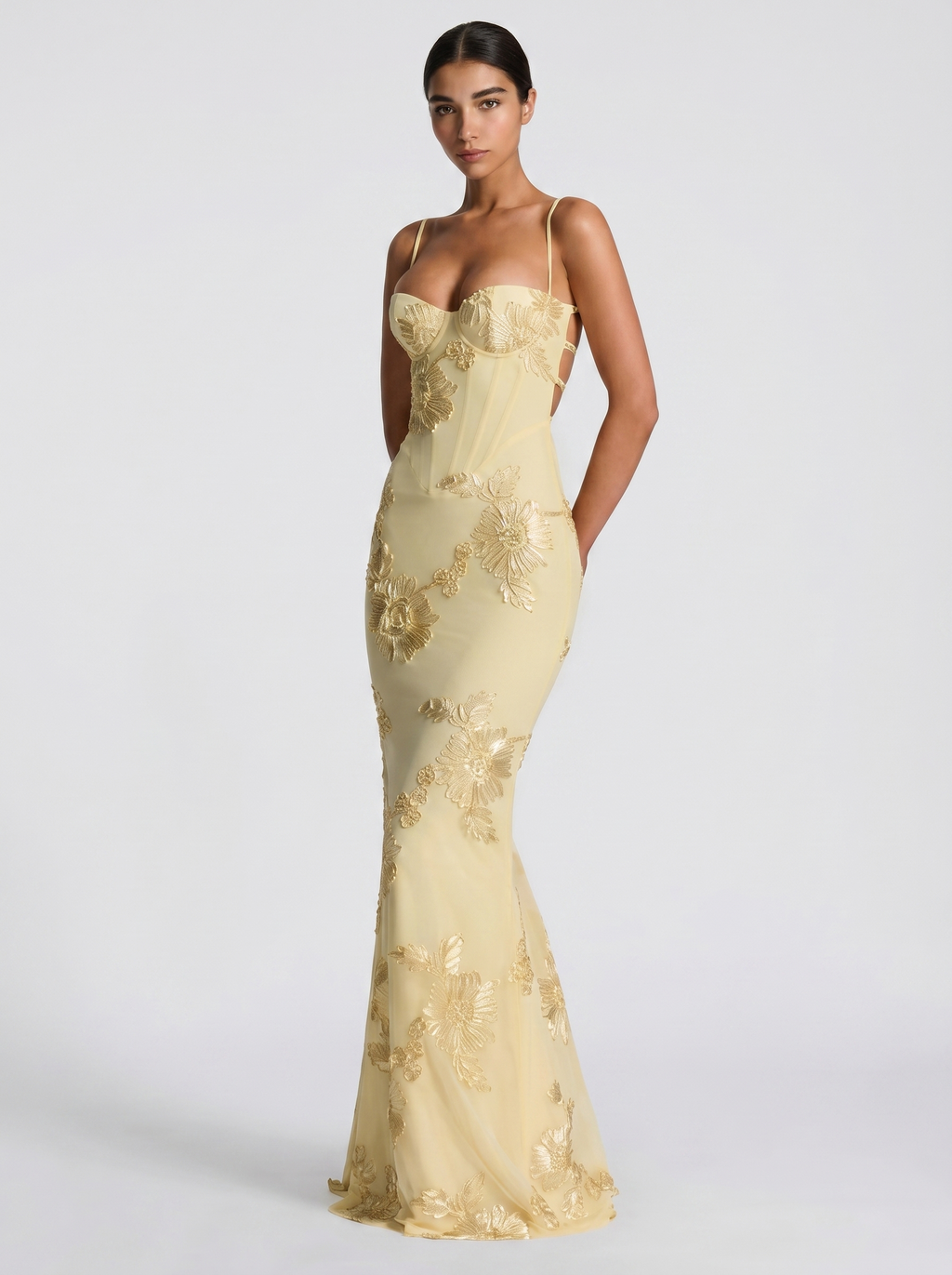 Lemon yellow floral evening dress, close view of fitted mermaid skirt