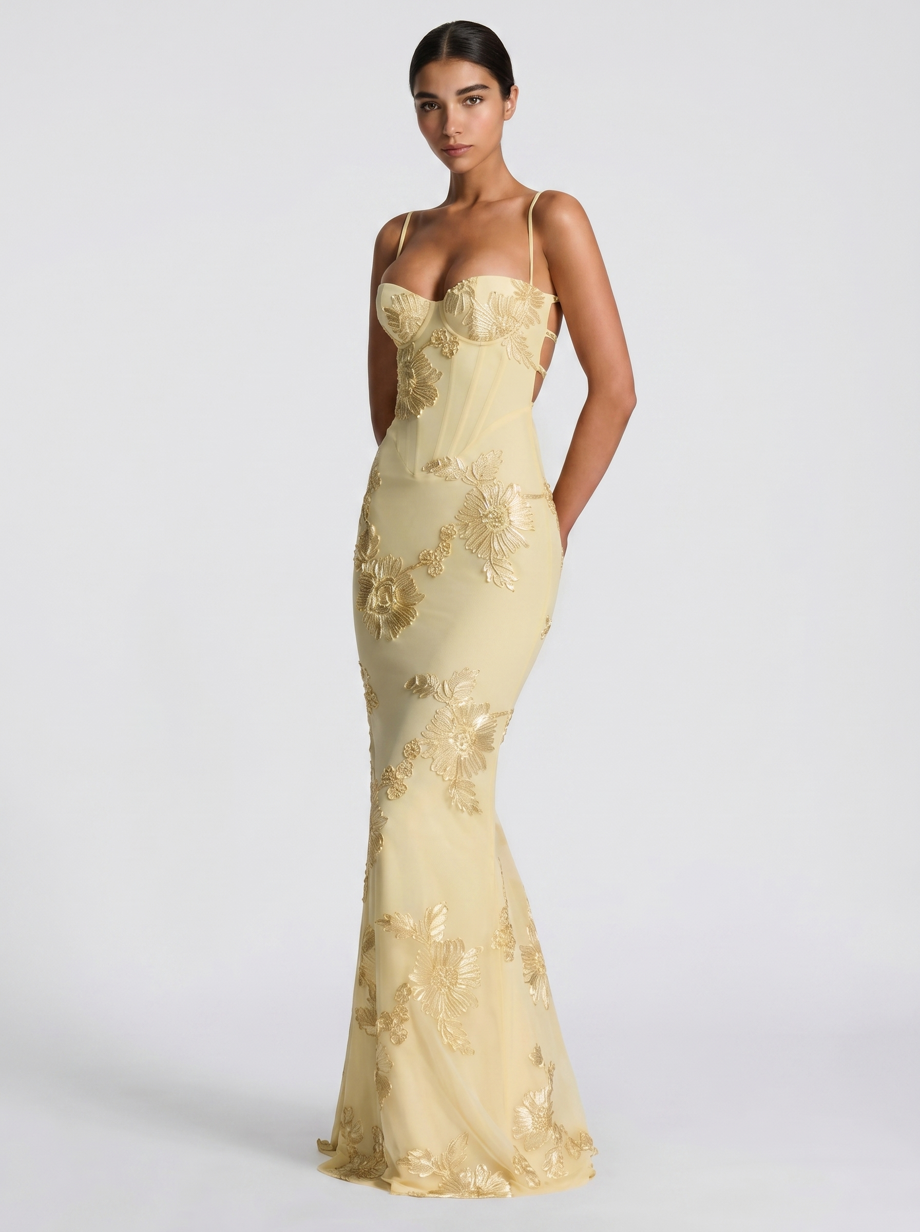 Lemon yellow floral evening dress, close view of fitted mermaid skirt