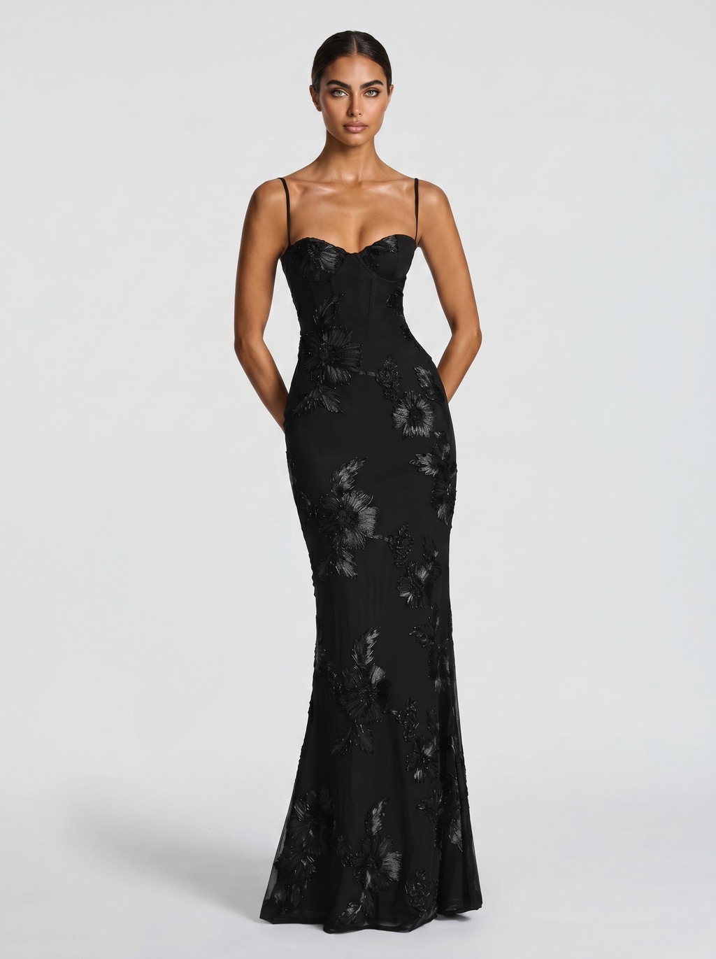 Black floral evening dress with spaghetti straps and fitted mermaid skirt