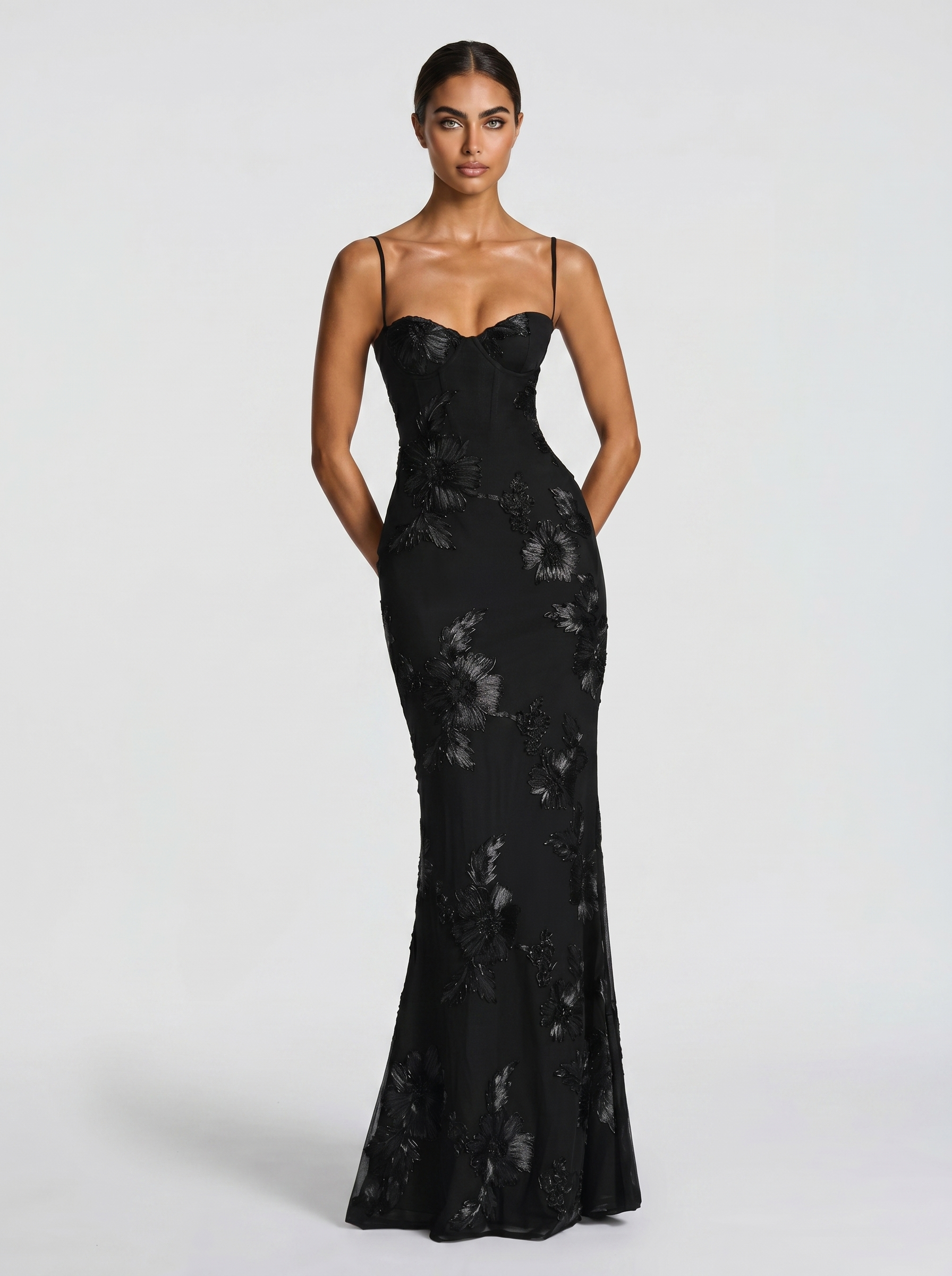 Black floral evening dress with spaghetti straps and fitted mermaid skirt