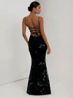 Black floral evening dress with crisscross open back and fitted mermaid silhouette
