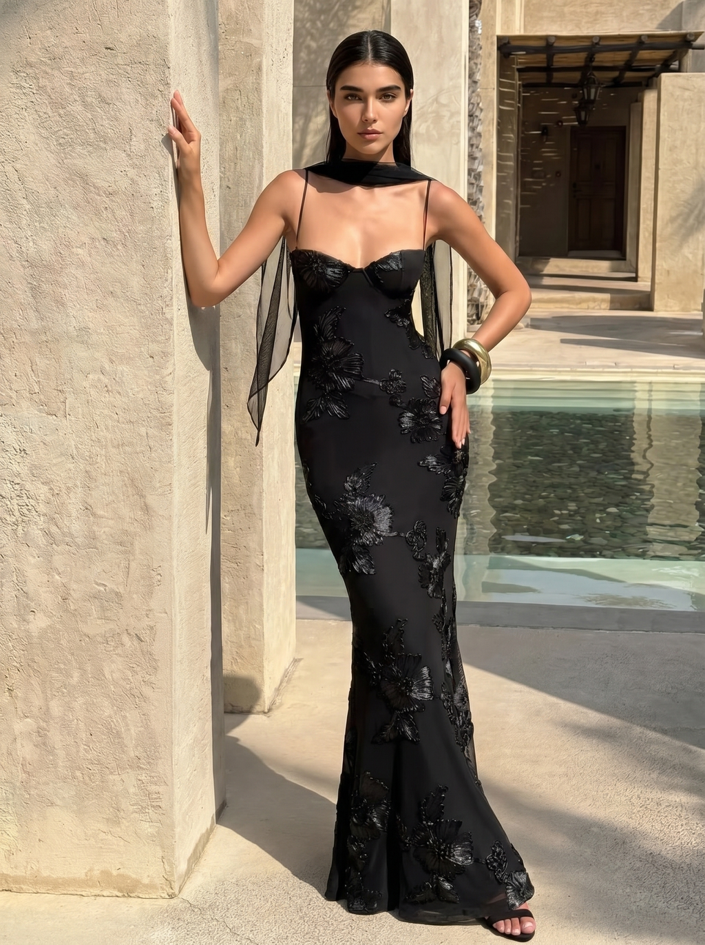 Black floral evening dress with sheer neckline overlay and fitted mermaid skirt