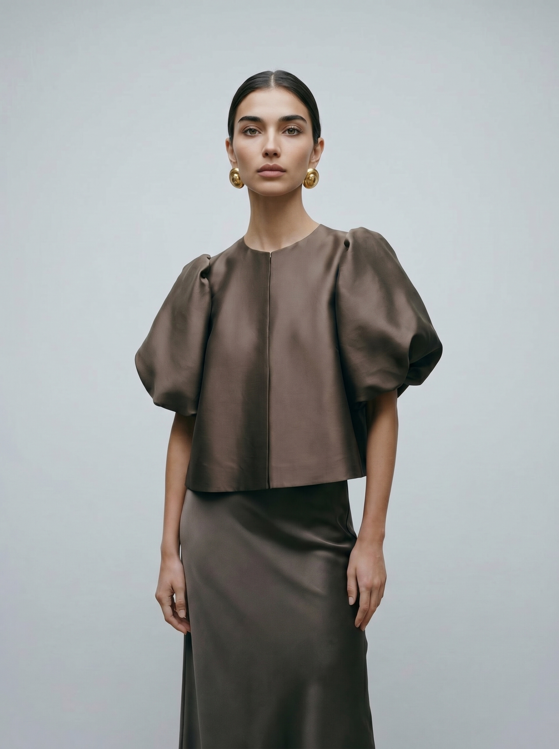 Dark brown puff sleeve blouse with center front button placket