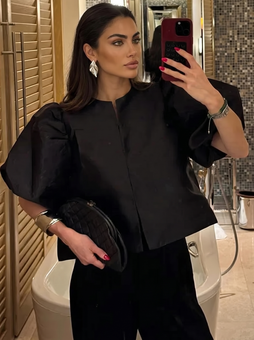 Black puff sleeve blouse with front button placket and short stand collar