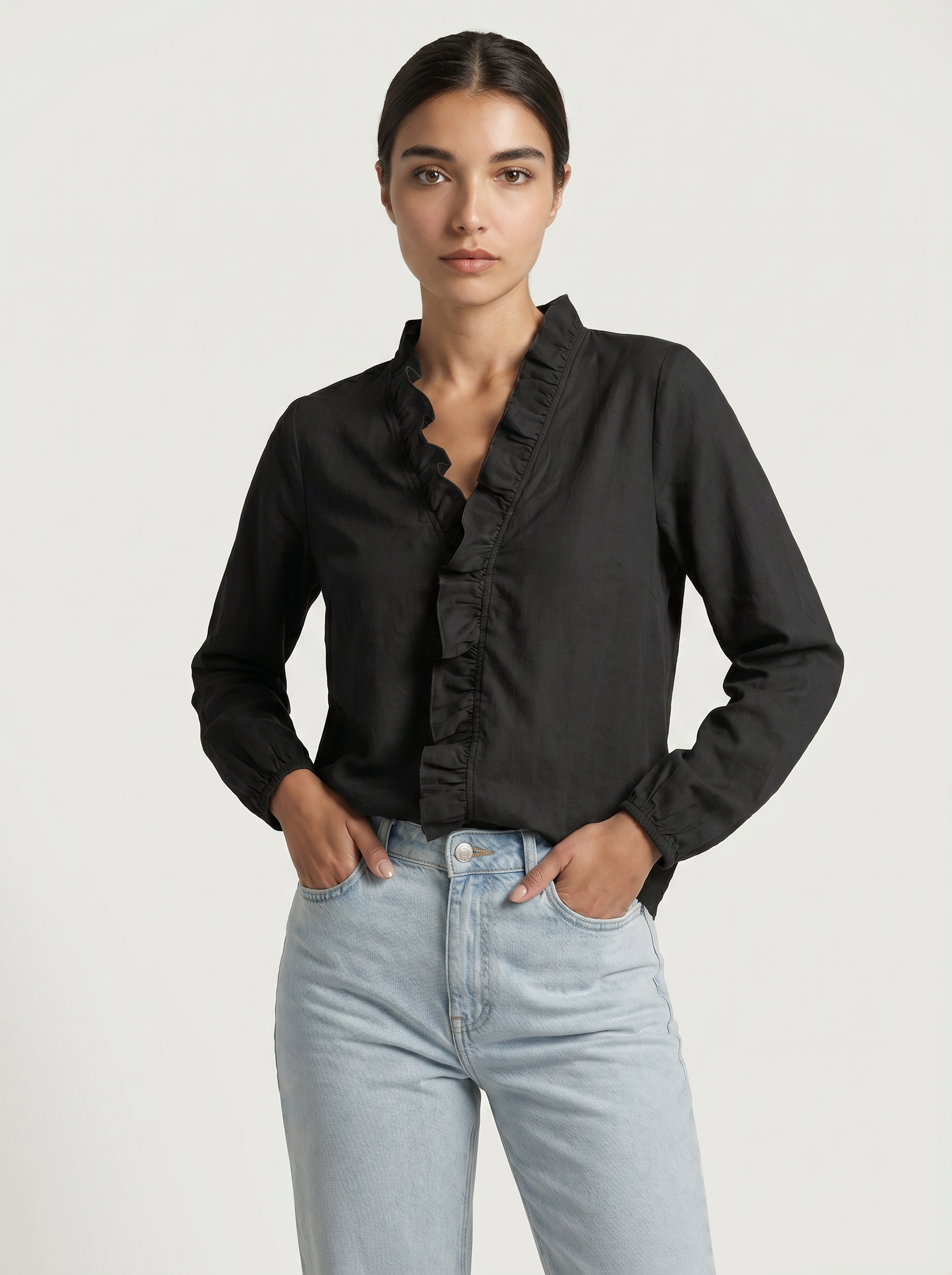 Black ruffle blouse with V-neck, long sleeves, button-front and gathered trim